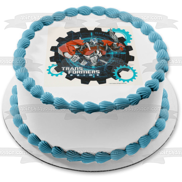 Transformers Optimus Prime Ion Blaster with an Assorted Gears Background Edible Cake Topper Image ABPID06659