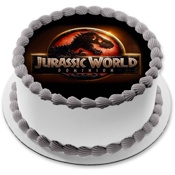 Logotipo de Jurassic World Dominion con un adorno comestible para pastel de T-Rex Imagen ABPID55531 